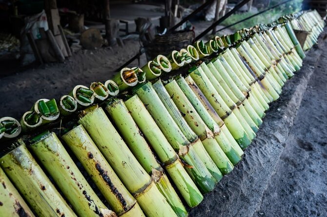 The Journey Phnom Penh to/from Siem Reap: A Memorable Tour - Bamboo sticky rice in a Cambodian village