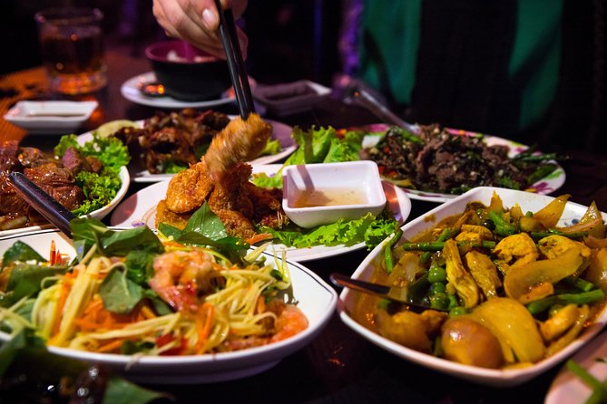 Ultimate Phnom Penh Food Tour by Tuk Tuk: 20 Tastings and Drinks - Russian Market after dark: ingredients and smoky ribs